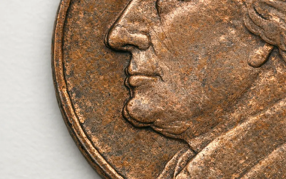 Close-up visual clues that help distinguish double die coin